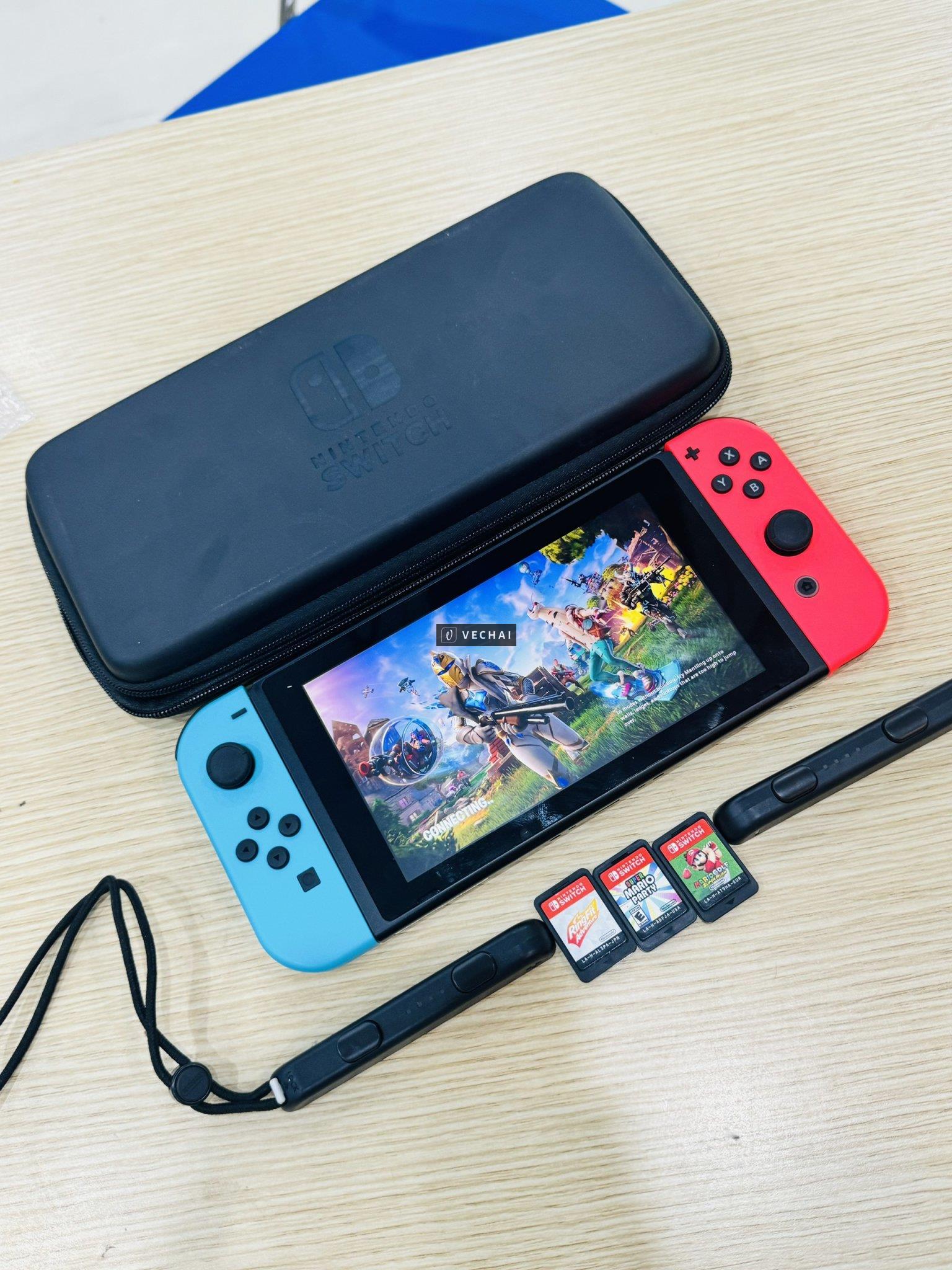 NITENDO SWITCH V2 có full đủ đồ tiện lợi – đầy đủ: túi đựng + máy + box xuất hình ra tivi + dây kết