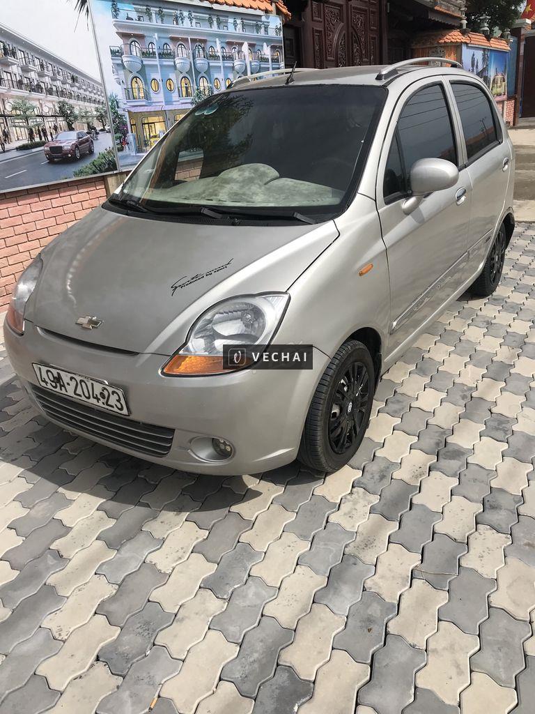 Xe chevrolet spark 5 chổ màu bạc