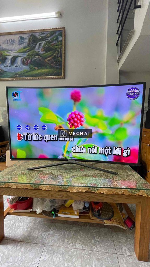 Em cần bán gấp tivi màn cong sam sung 49in 4k